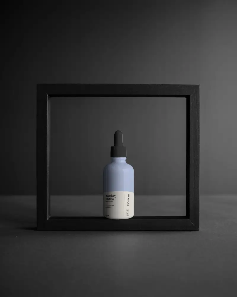 Minimalist Dropper Bottle Mockup Framed In Black Modern Monochrome Aesthetic
