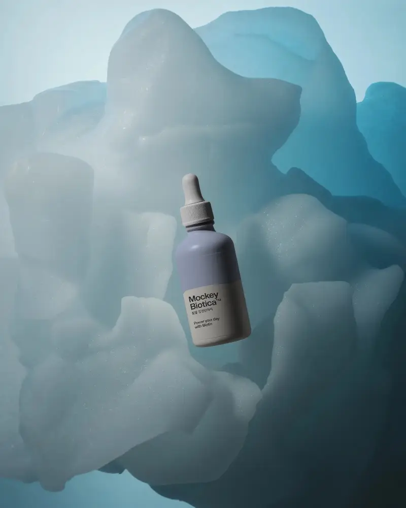 Sleek Dropper Bottle Mockup Design On Unique Sculptured Background For Product Display