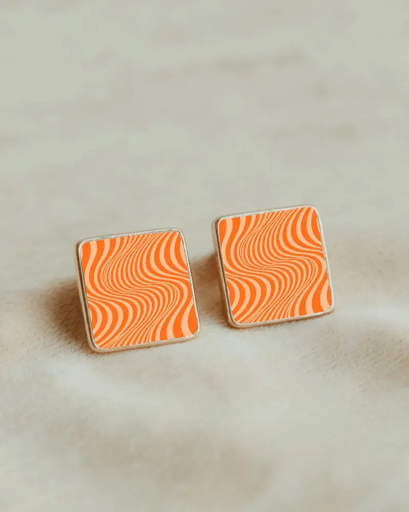 Elegant Square Stud Earring Mockup With Black Center On Soft Beige Textured Fabric