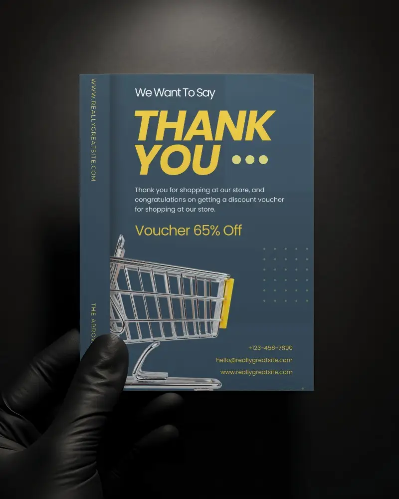 A6 Flyer Mockup Held In Black Gloved Hand Minimal Dark Background Focused Lighting