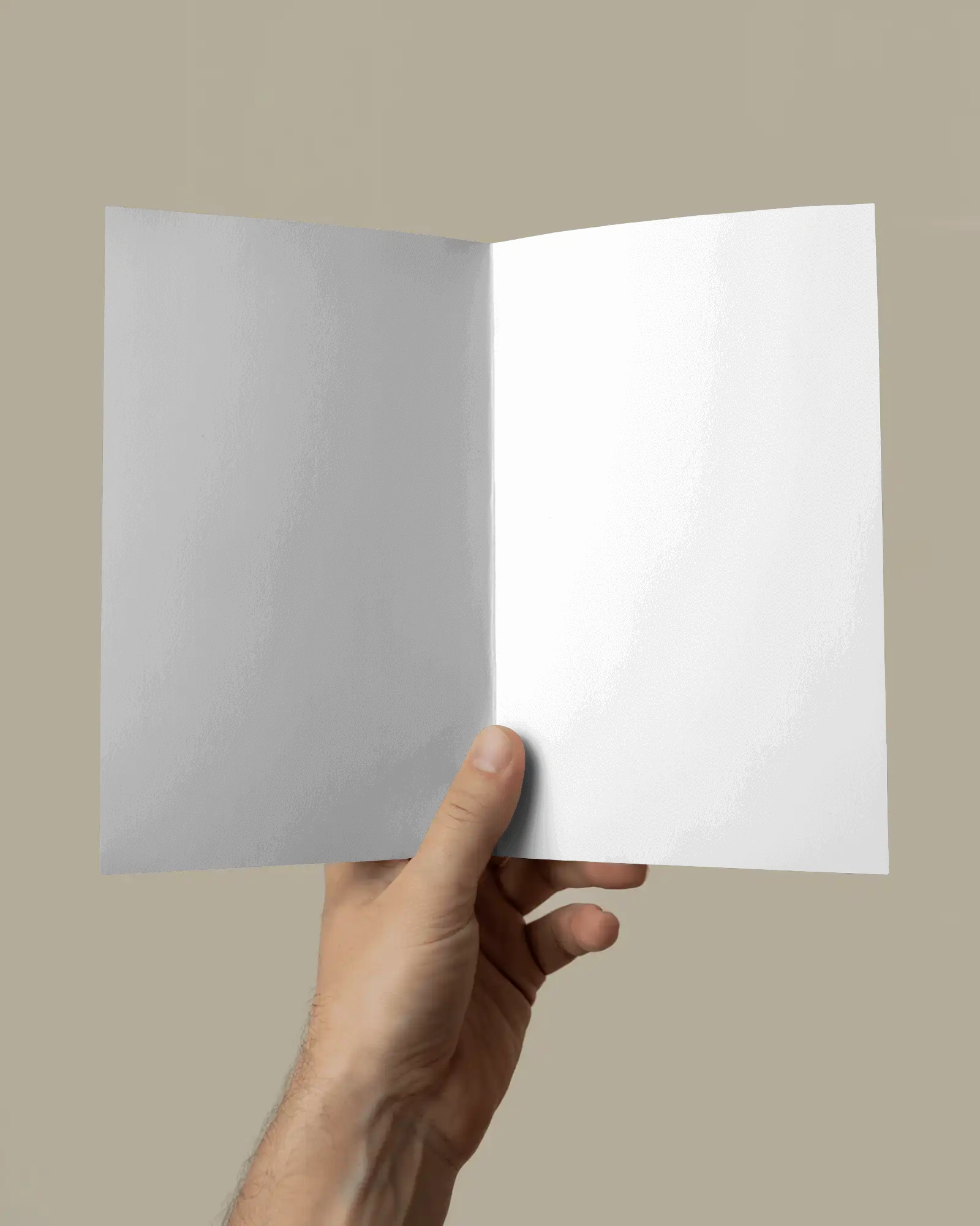 Hand Holding Open Bifold Flyer Mockup For Custom Print Design Promotion Advertisement