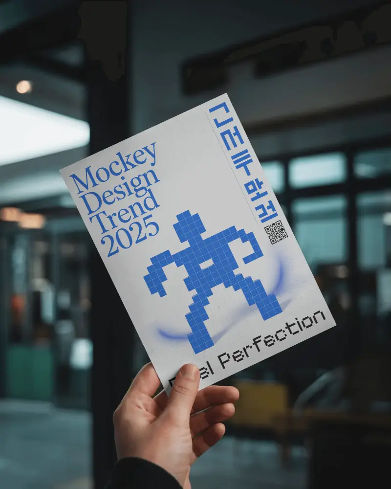 urban-handheld-flyer-mockup-in-modern-cafe-setting-with-soft-daylight-and-glass-doors