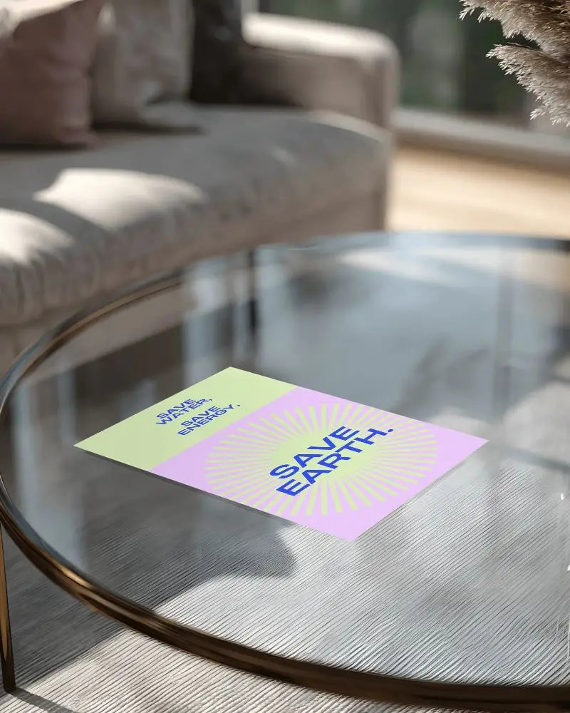 Blank Flyer Mockup On Glass Coffee Table With Sofa In Bright Modern Living Room Scene