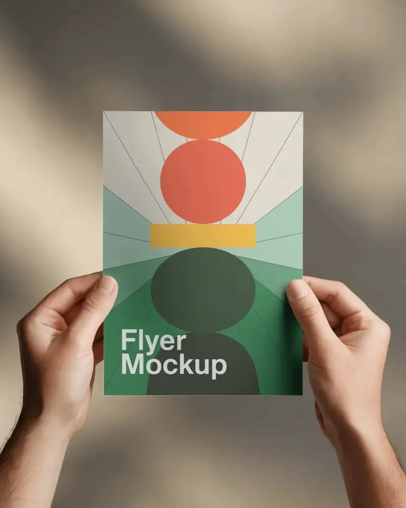 Hands Holding Blank Flyer Mockup Over Soft Gradient Background For Design Presentation