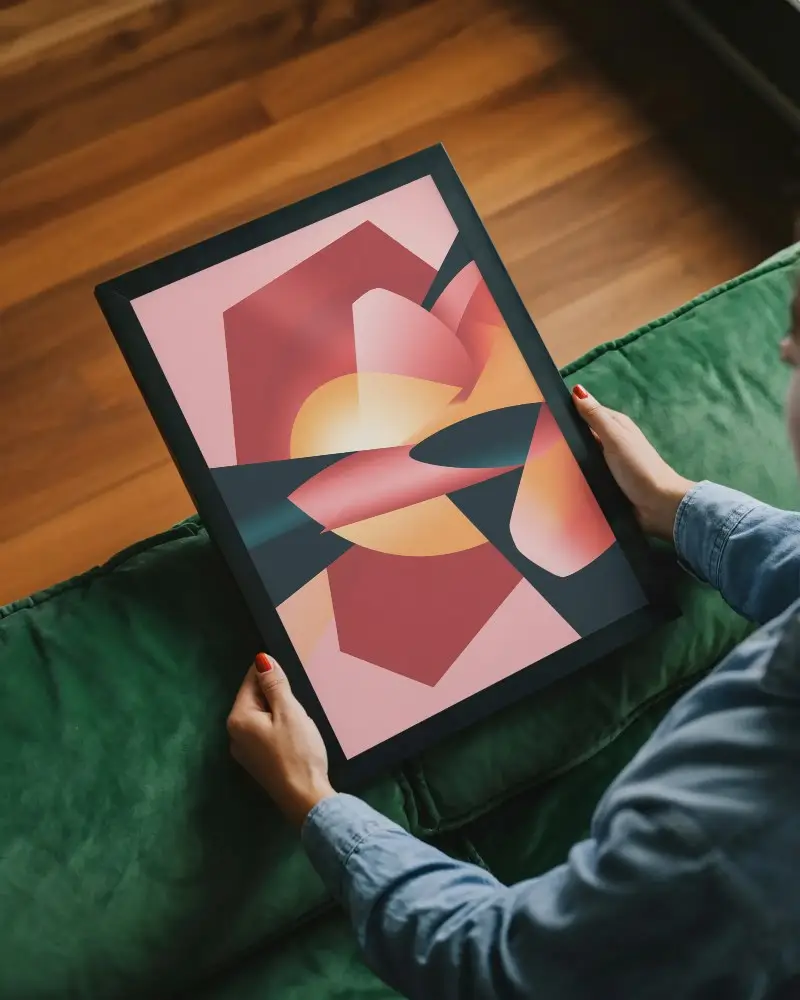 Modern Minimalist Photo Frame Mockup Held By Person Sitting On Couch For Wall Art Display