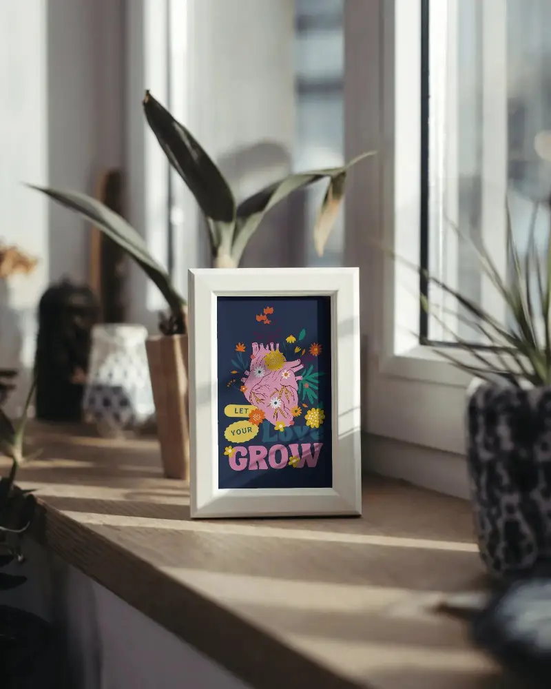 neutral-interior-frame-mockup-basking-in-sunlight-on-wooden-surface-with-potted-plants-for-design-showcase