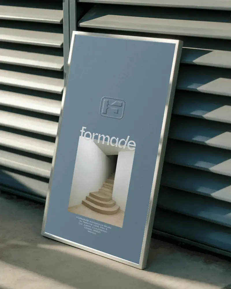 Sleek Photo Frame Propped Up On Concrete Surface With Shadow Pattern Behind