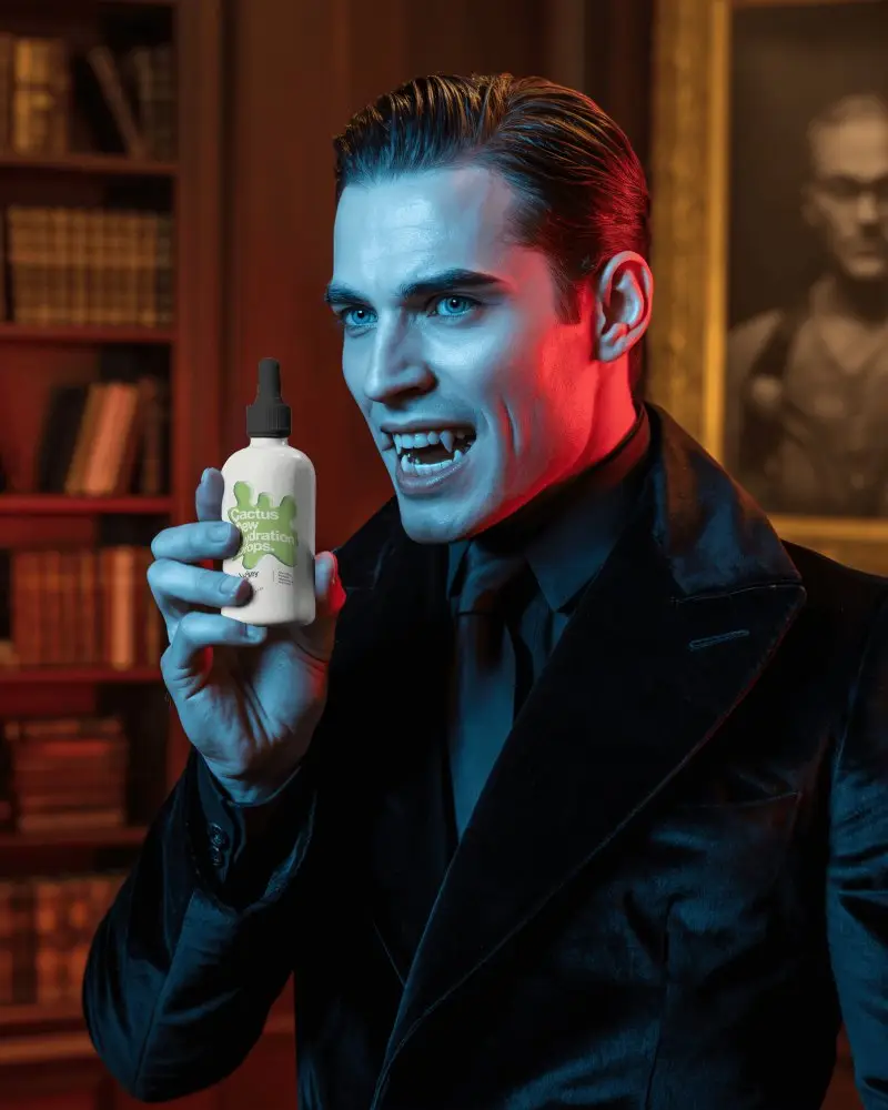 Gothic Vampire Dropper Bottle Mockup Dark Elegant Red Blue Lighting Intense Expression