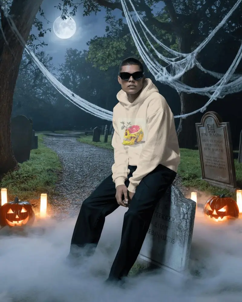 Eerie Halloween Mockup With Man In Hoodie Glasses Sitting On Gravestone Surrounded By Fog