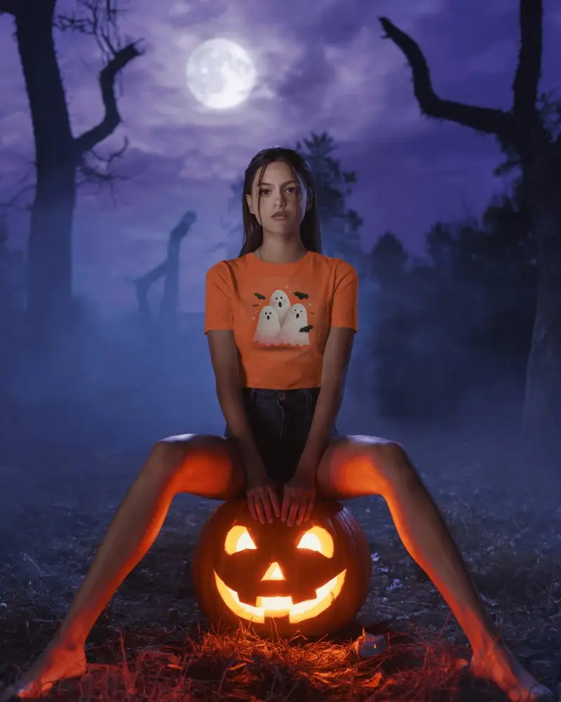 Eerie Halloween Scene Female Model Posing With Tshirt Mockup Lit Jackolantern In Haunted Woods