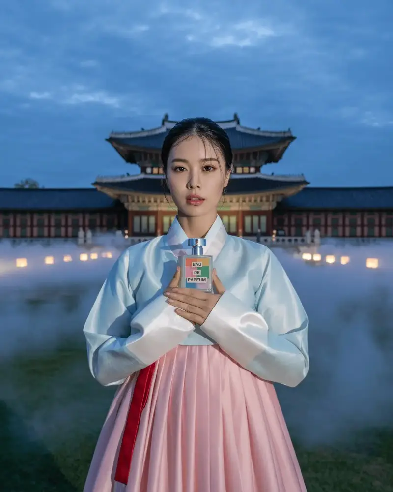 Halloween Perfume Mockup Woman In Traditional Hanbok Holding Bottle In Misty Palace Yard