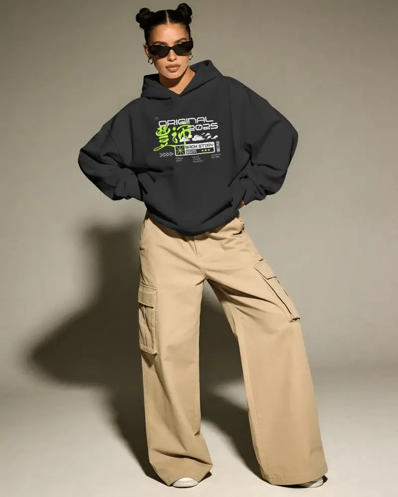 Hoodie Mockup With Standing Model Hands In Pocket Beige Pants Studio Light Clean Style