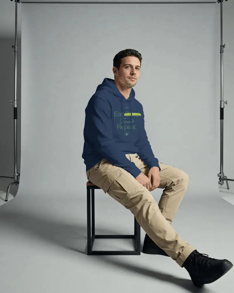Studio Sitting Hoodie Mockup Grey Backdrop Clean Photoshoot Style Look