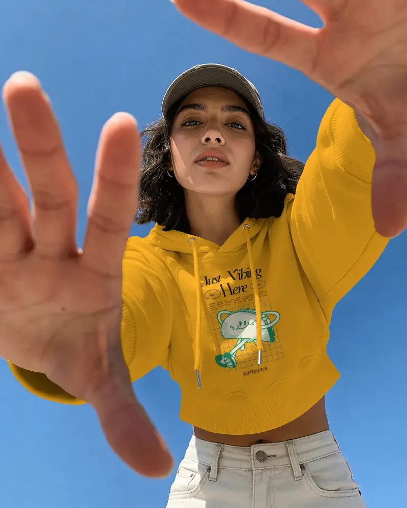 Low Angle Hoodie Mockup On Model With Reaching Hands And Clear Sky Background