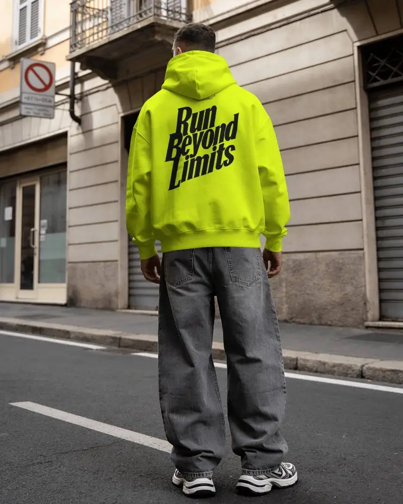 Etsy Hoodie Mockup Back View Male Model Standing On Quiet City Street In Relaxed Oversized Fit