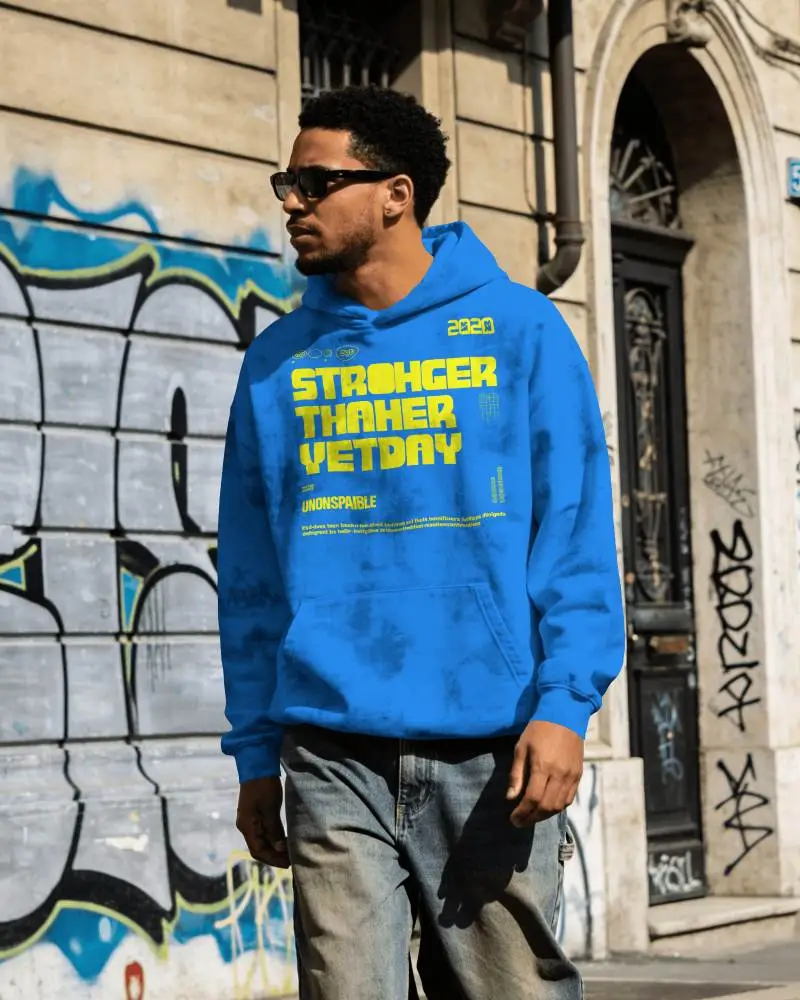 Printful Hoodie Mockup Front View Male Model Wearing Tie Dye Hoodie In Urban Graffiti Street Scene