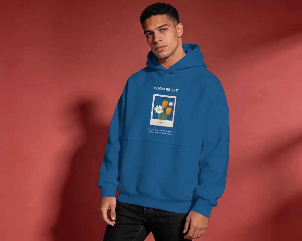 Printful Red Studio Hoodie Mockup Front View Male Model Standing In Soft Shadow Fashion Lighting