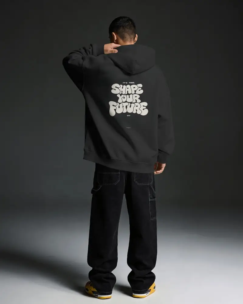 Back View Hoodie Mockup Male Model Touching Hood In Dark Minimal Premium Studio Lighting