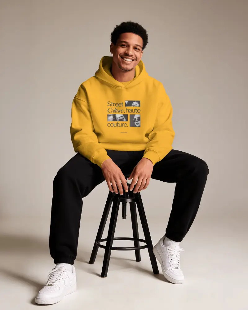 Comfortable Casual Hoodie Mockup Wearing Model Sitting On Stool In Relaxed Pose For Fashion