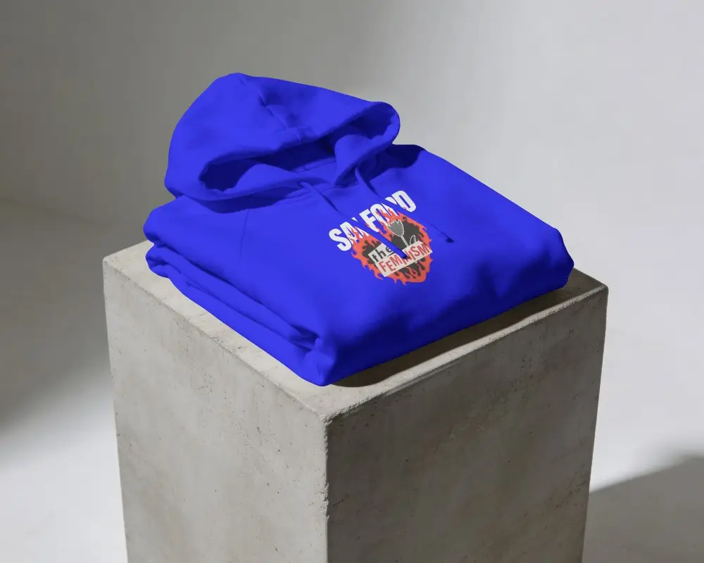 Folded Hoodie Mockup On Concrete Pedestal With Soft Gray Studio Lighting And Realistic Fabric