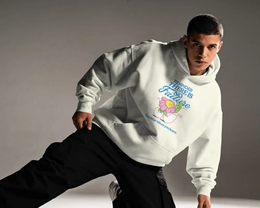 Dynamic Mens Hoodie Mockup With Athletic Model Leaning Forward In Low Crouched Action Pose