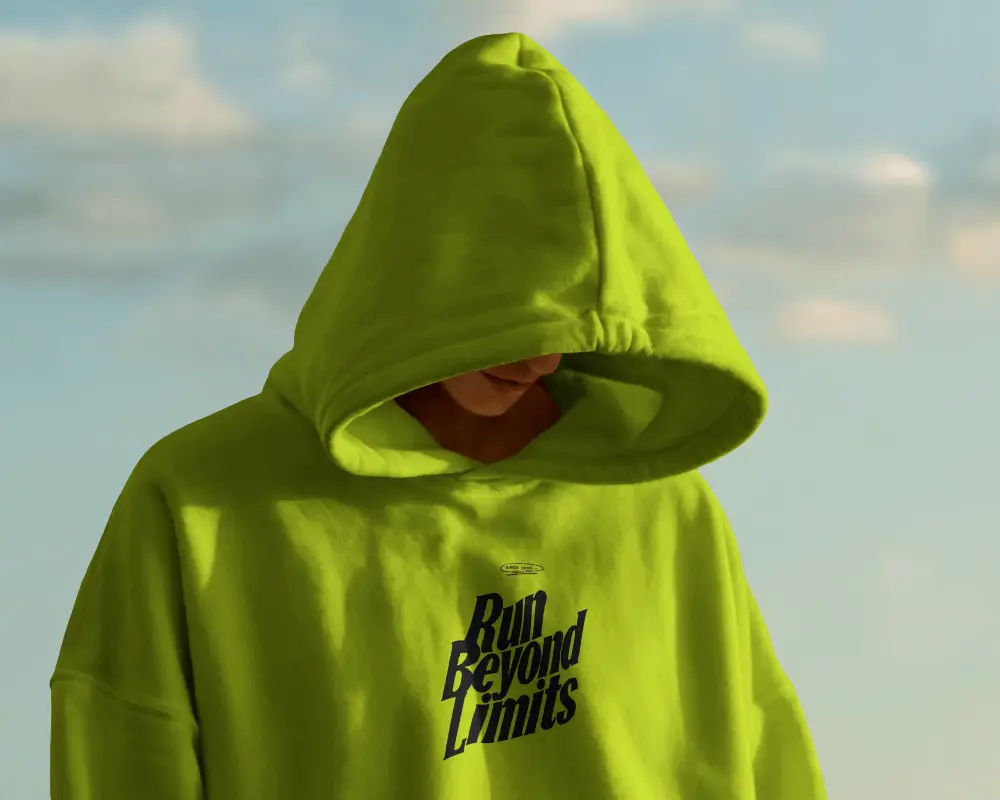Outdoor Editorial Hoodie Mockup Mysterious Model With Hood Up Against Soft Cloudy Sky
