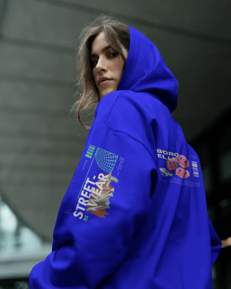 Urban Street Hoodie Mockup Female Model Looking Over Shoulder Modern Architectural Setting