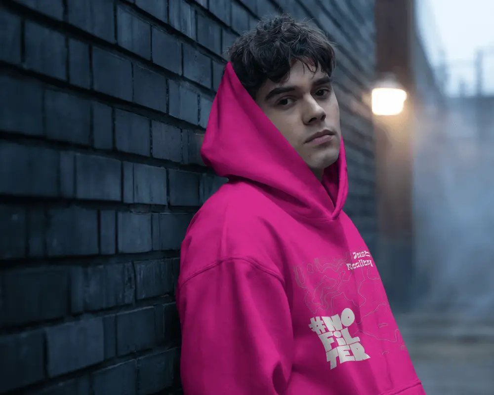 Moody Streetwear Hoodie Mockup Male Model Leaning On Dark Brick Wall Evening Scene