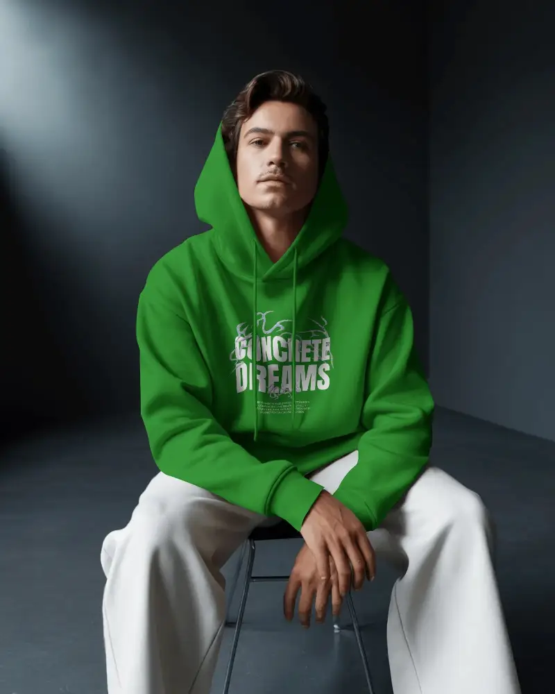 Premium Soft Fabric Hoodie Mockup With Hood Up Seated Male Model For Clothing Marketing