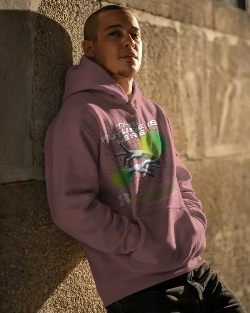 Men Comfortable Hoodie Mockup Near Textured Wall For Fashion Brand Promotion