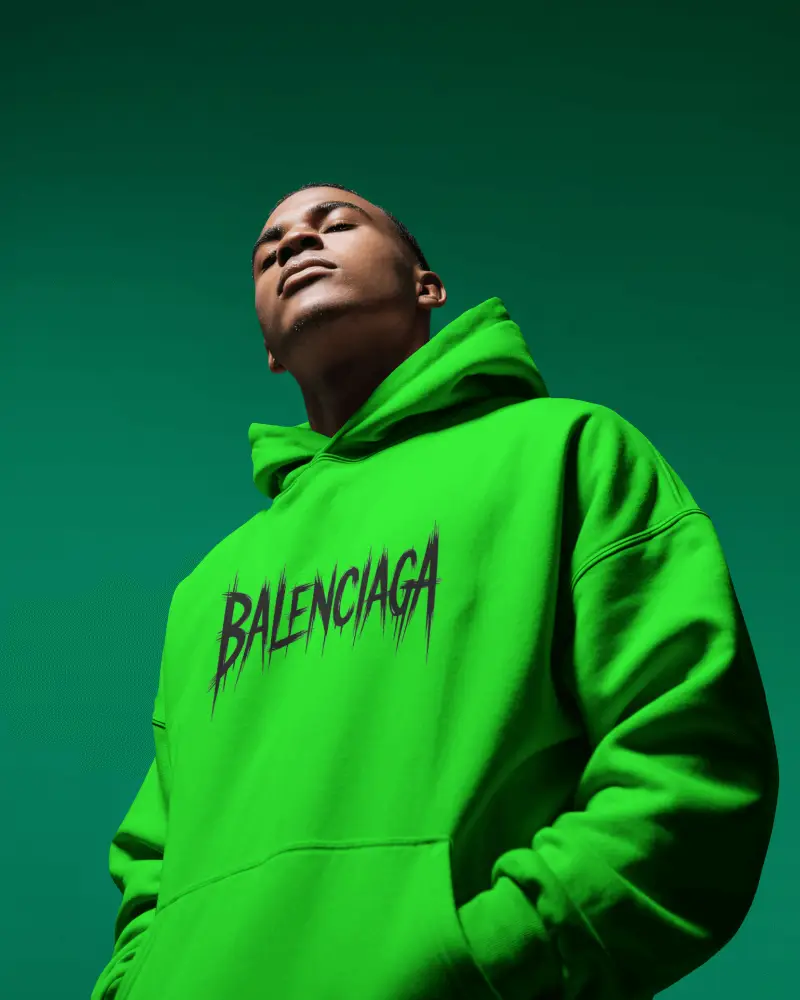 Bold Green Background Hoodie Mockup Male Model Upward Angle Power Pose