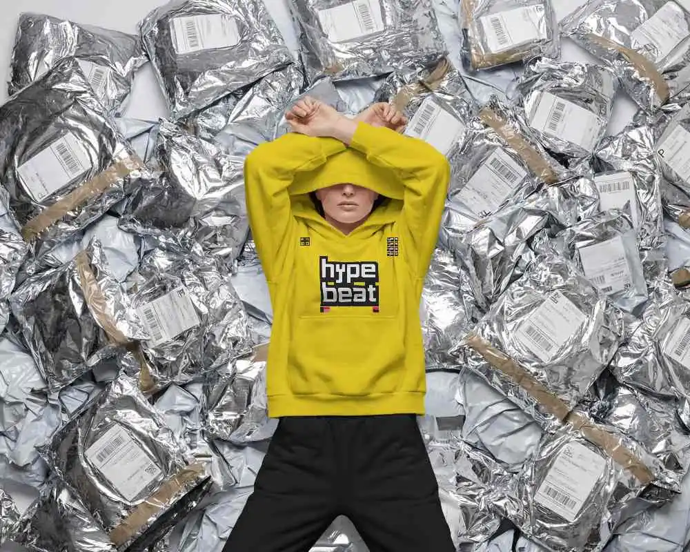 Conceptual Studio Hoodie Mockup Model Lying On Packaging Boxes Creative Editorial Fashion