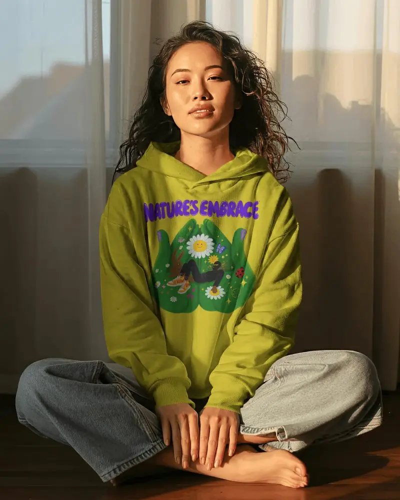 Sunlit Window Hoodie Mockup Female Model Sitting Cross Legged In Warm Golden Hour Light