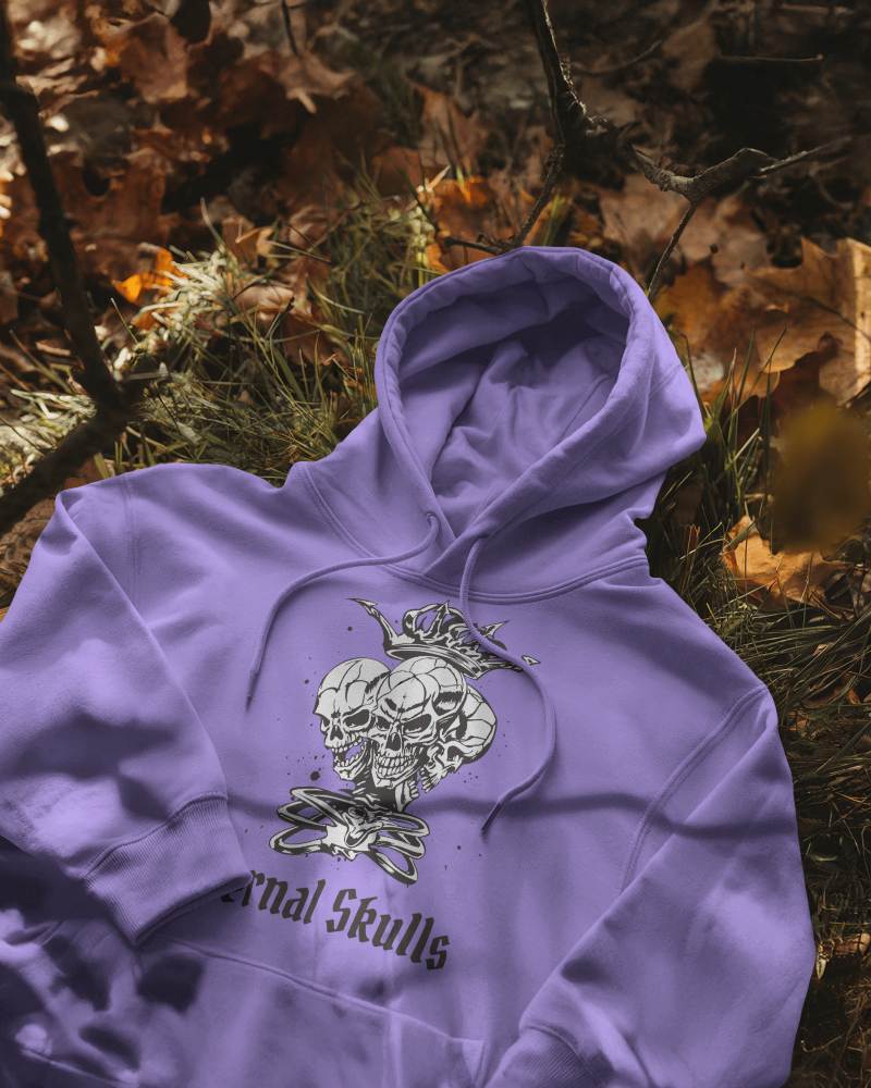 Eerie Forest Hoodie Mockup Purple Apparel With Dark Skulls Graphic On Grass