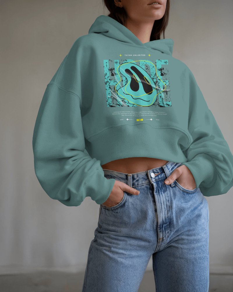 Minimalist Cropped Hoodie Mockup Female Model In High Waisted Denim With Modern Graphic Design