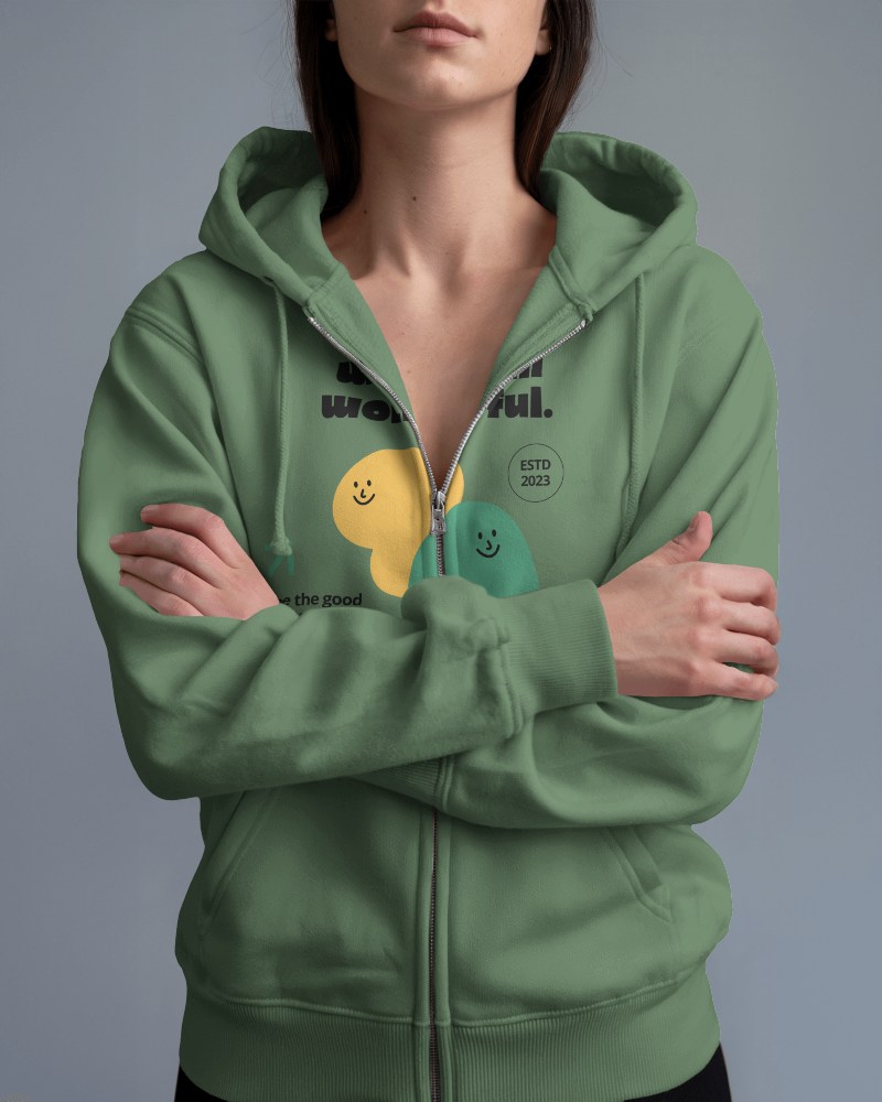 Olive Green Hoodie Mockup Female Model Showcasing Fun Emoticon Prints Modern Streetwear