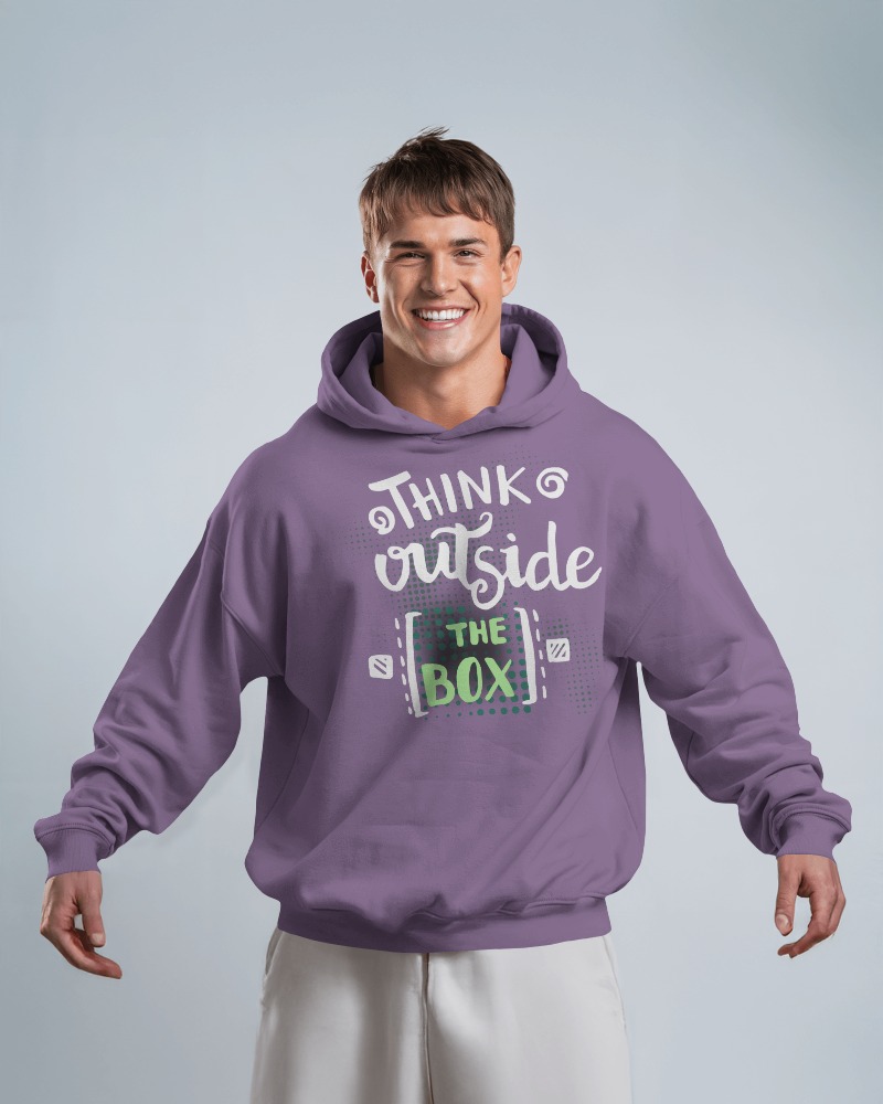 Joyful Male Model Purple Hoodie Mockup Promoting Unique Think Outside The Box Idea Casual Look