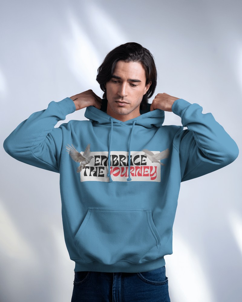 Vibrant Sky Blue Hoodie Mockup Male With Long Hair Under Bright Focus Lighting Showcasing Motivational Quote
