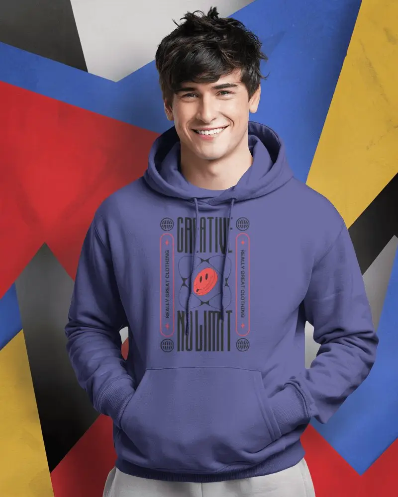 Vibrant Street Style Hoodie Mockup With Smiling Male Model In White Hoodie Against Colorful Geometric Wall