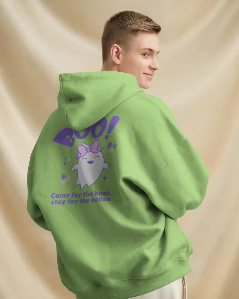 Cozy Studio Hoodie Mockup Smiling Man In Relaxed Hoodie Against Beige Curtains