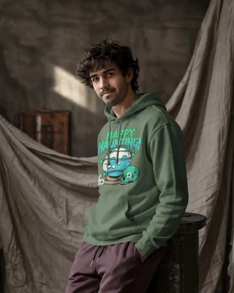 Rustic Studio Hoodie Mockup Male Model Leaning Casually Against Industrial Backdrop