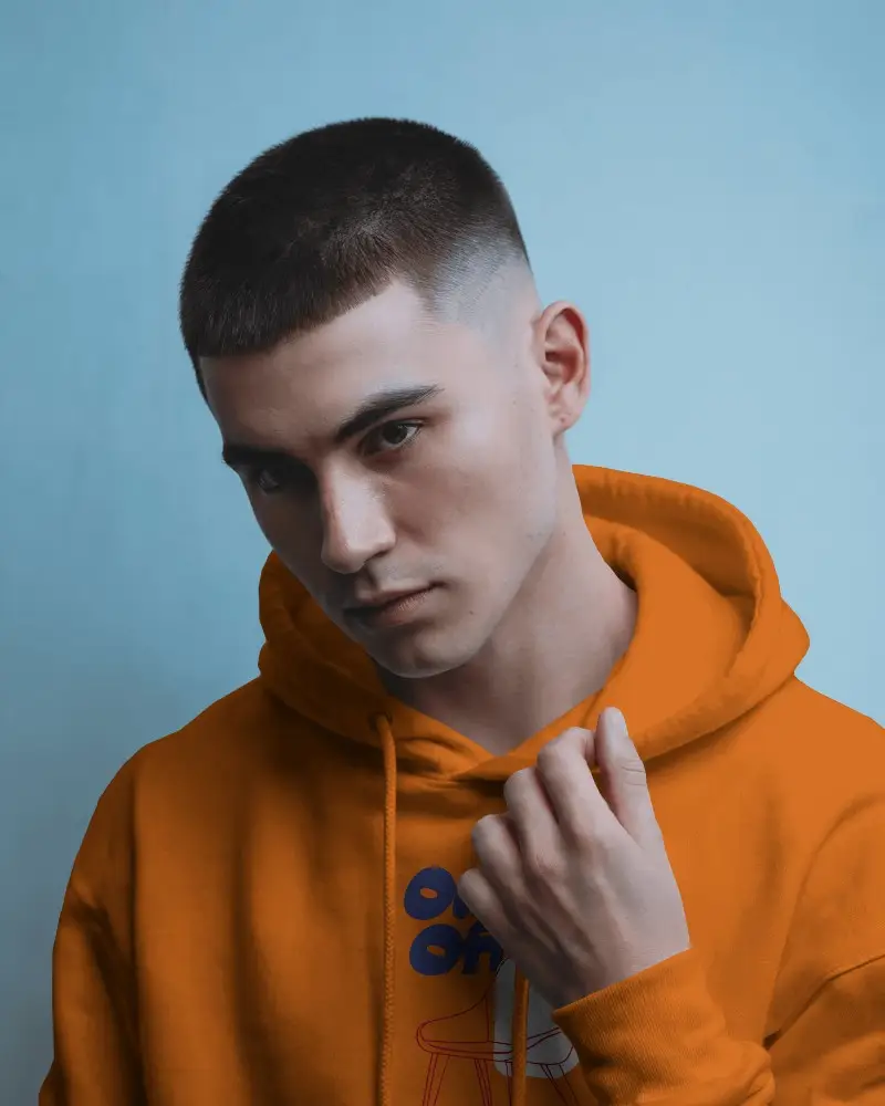 Designer Cropped Hoodie Mockup Female Model In Monochrome Outfit Oversized Silhouette With Raw Edge Hem Paris Fashion Week Vibes