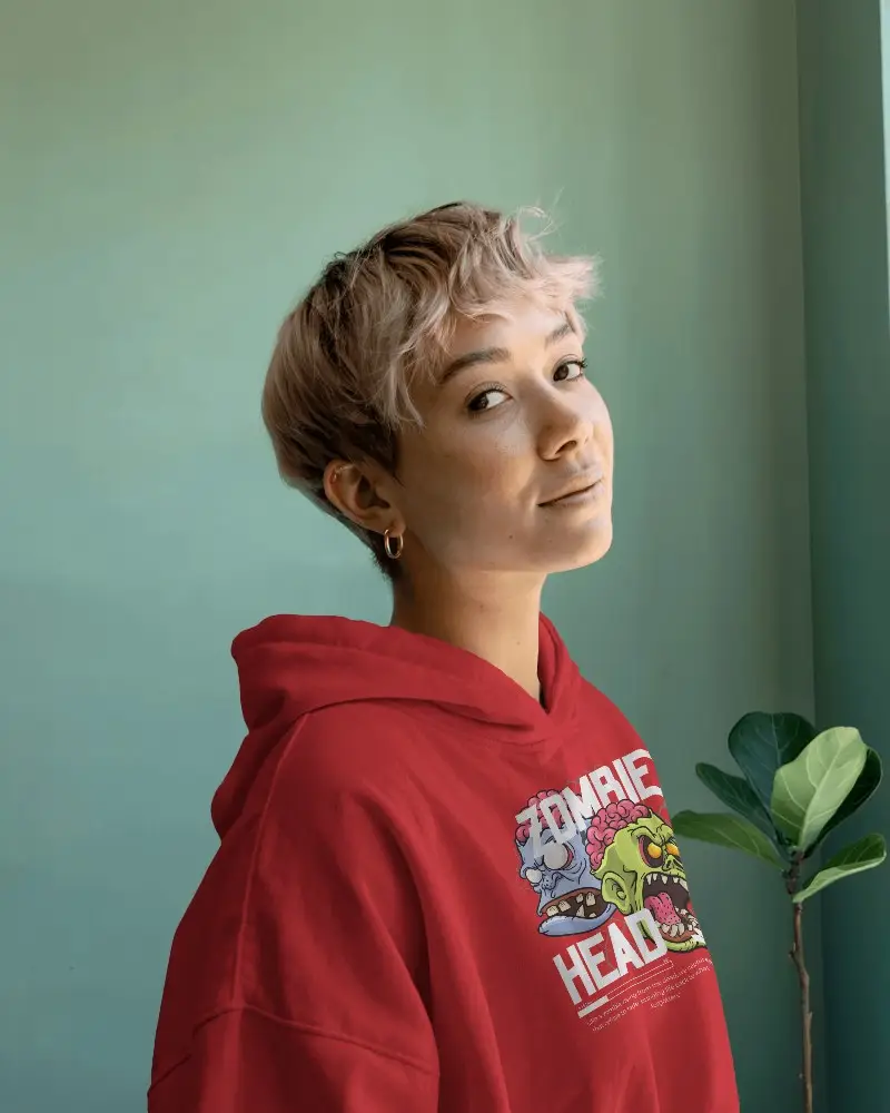 Fashionable Female Model Presenting A Casual Hoodie Mockup With Design Space