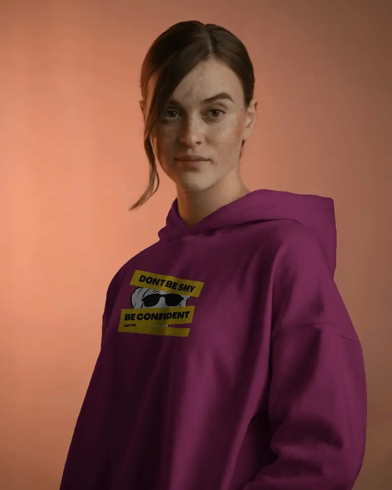 Urban Wear Female Hoodie Mockup Presented By Model In Pastel Studio For A Trendy Vibe