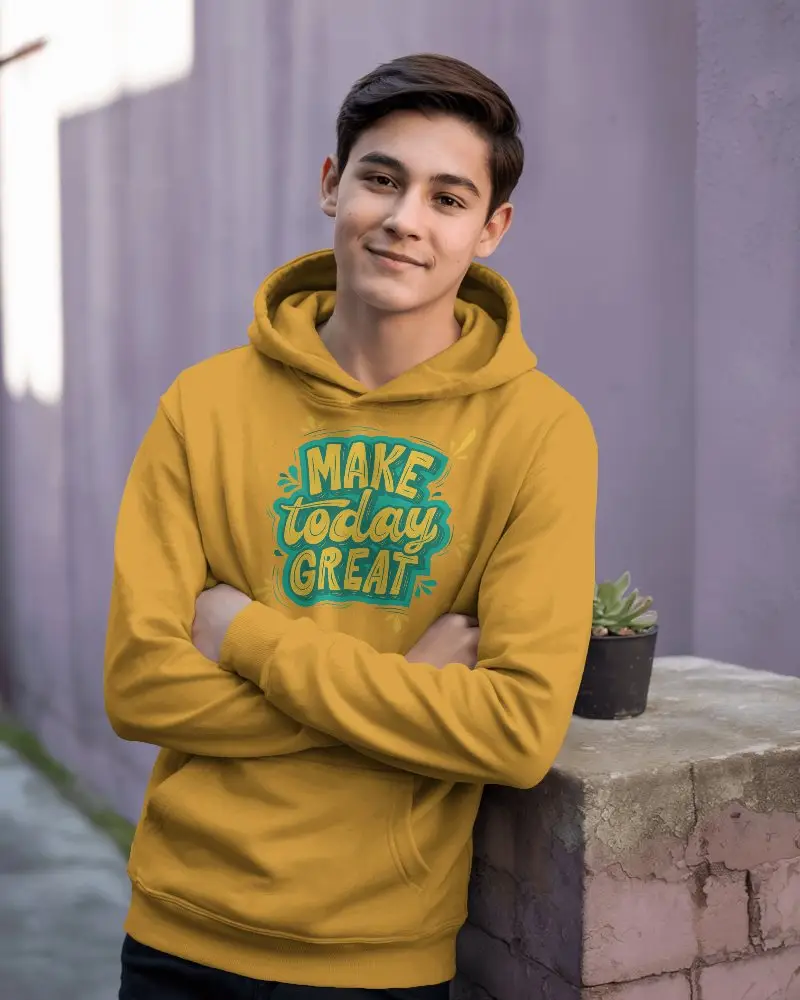 Youthful Male Model Presenting A Casual Hoodie Mockup With Custom Design Space Against Pastel Background