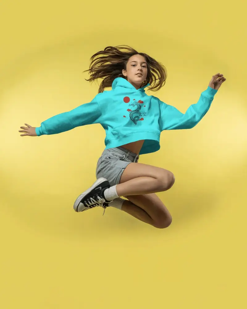 Dynamic Jump Cropped Hoodie Mockup Female Model In Motion On Yellow Background