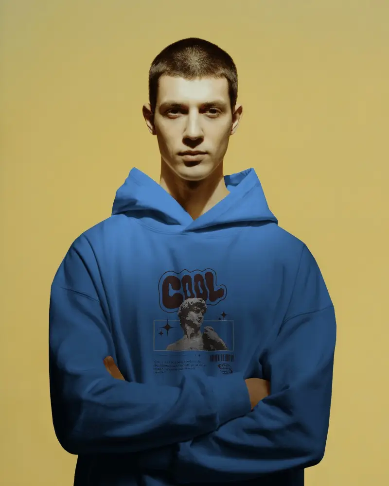 Bold Studio Hoodie Mockup Male Model Crossing Arms With Confident Expression Against Warm Yellow Background 0595