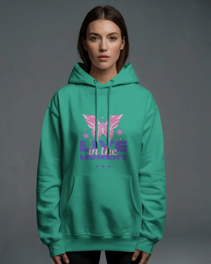 Centered Studio Hoodie Mockup Female Model Standing Straight In Even Lighting With Soft Grey Background 0597