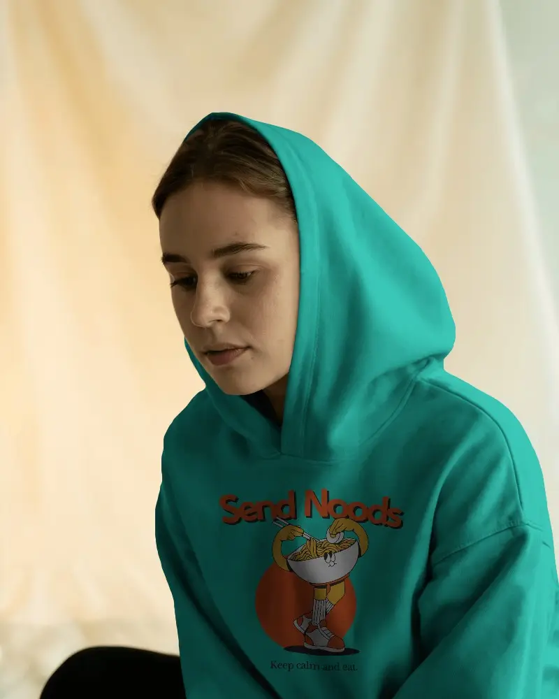 Cozy Indoor Hoodie Mockup Featuring Thoughtful Expression Model In Soft Natural Light For Calm Fashion Campaign