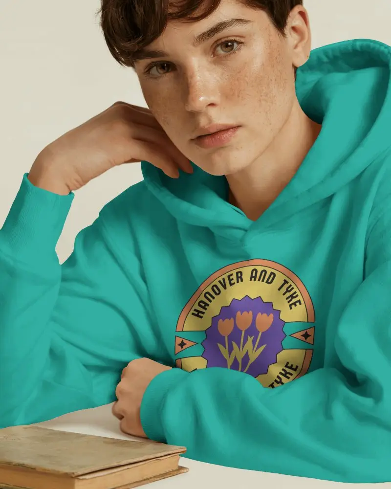 Thoughtful Pose Hoodie Mockup Closeup With Soft Shadows And Simple Props